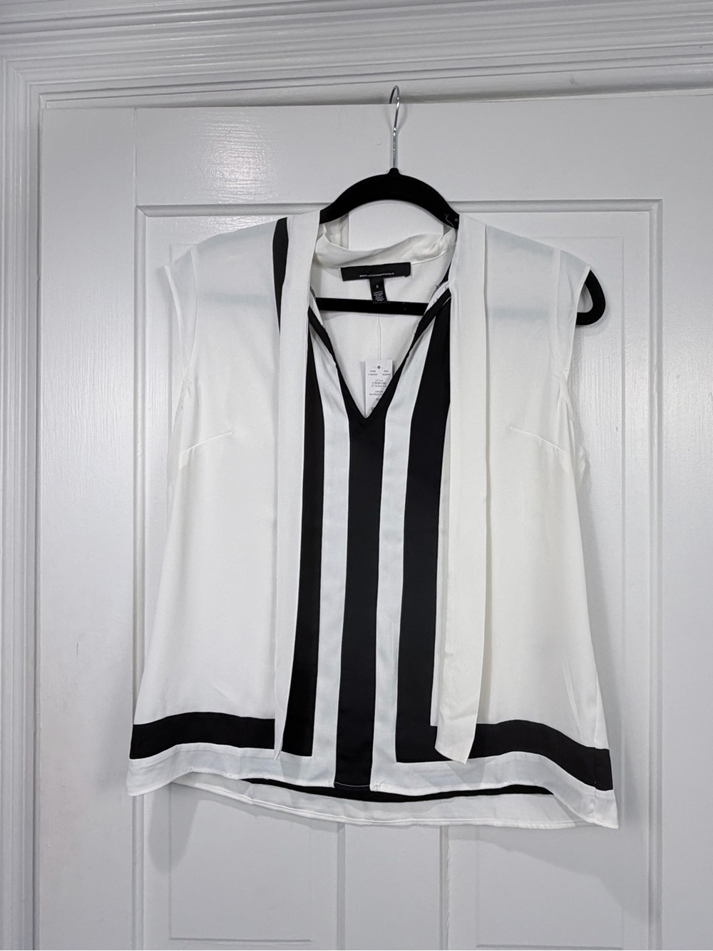 Women’s White Sleeveless V-Neck Blouse with Black Stripe Detail